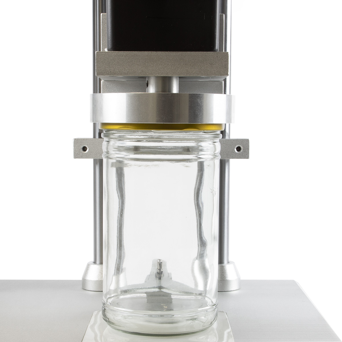 Automatická víčkovačka pro zavařovací sklenice a láhve se šroubovacím uzávěrem